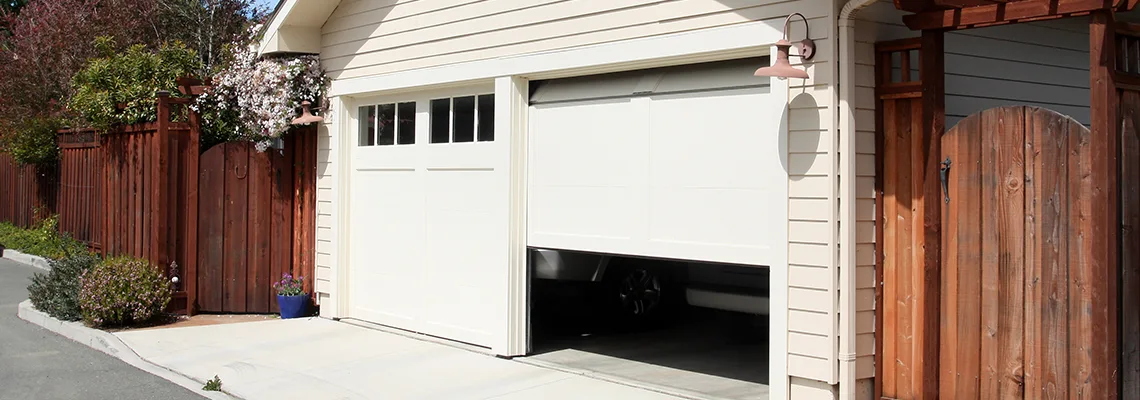 Fix Metal Garage Door Jerking in Delray Beach